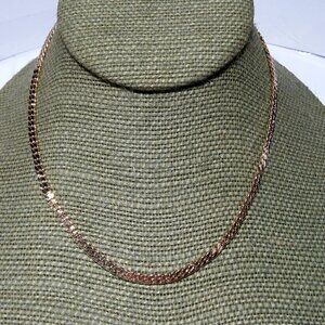 Women`s gold tone marked "avon" necklace.